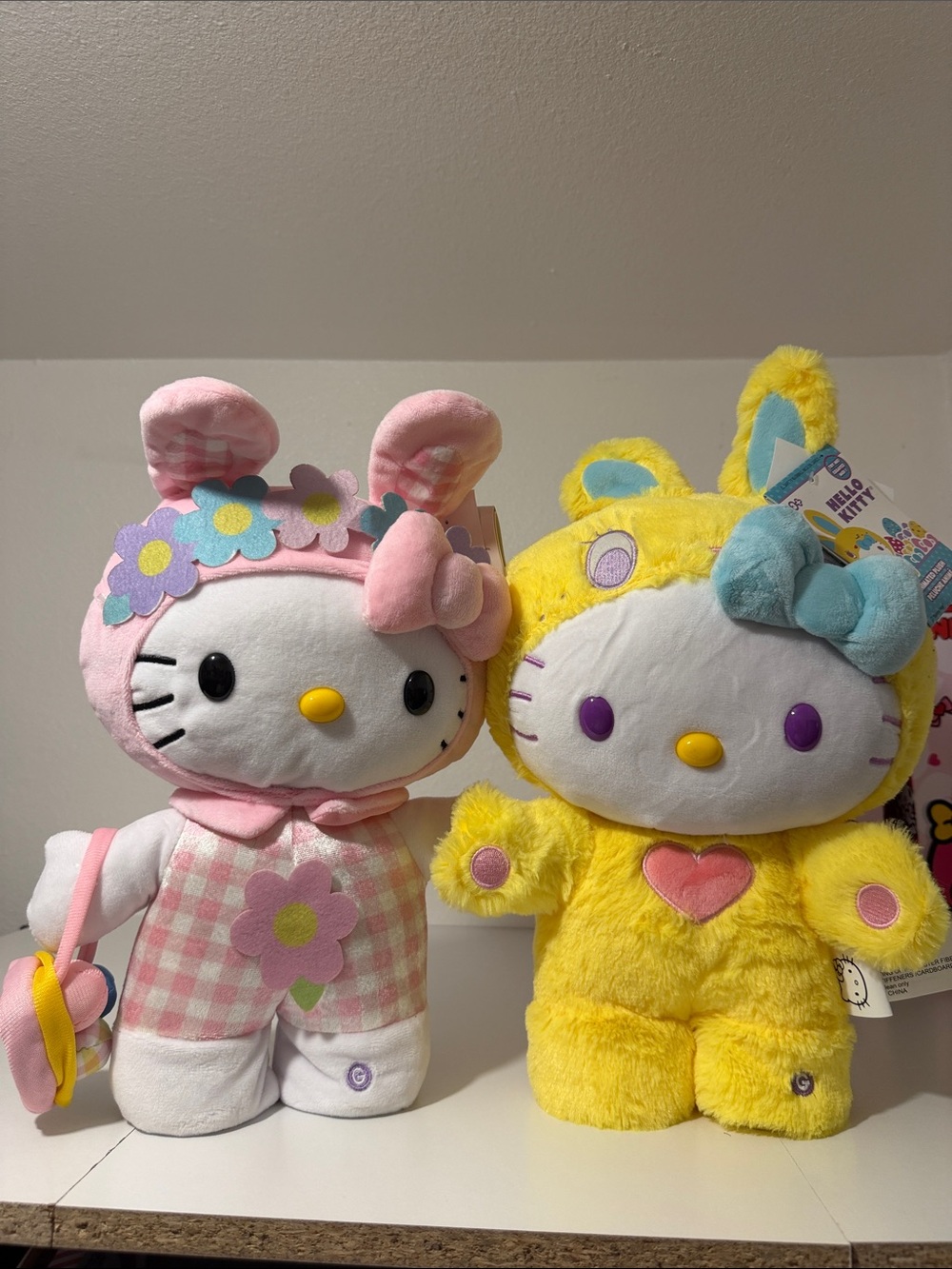 Sanrio Hello Kitty Plush Pair in Pink Floral & Bright Yellow Bunny Suits